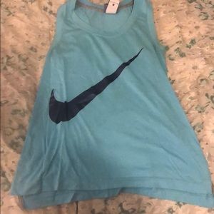 Light blue Nike tank top.